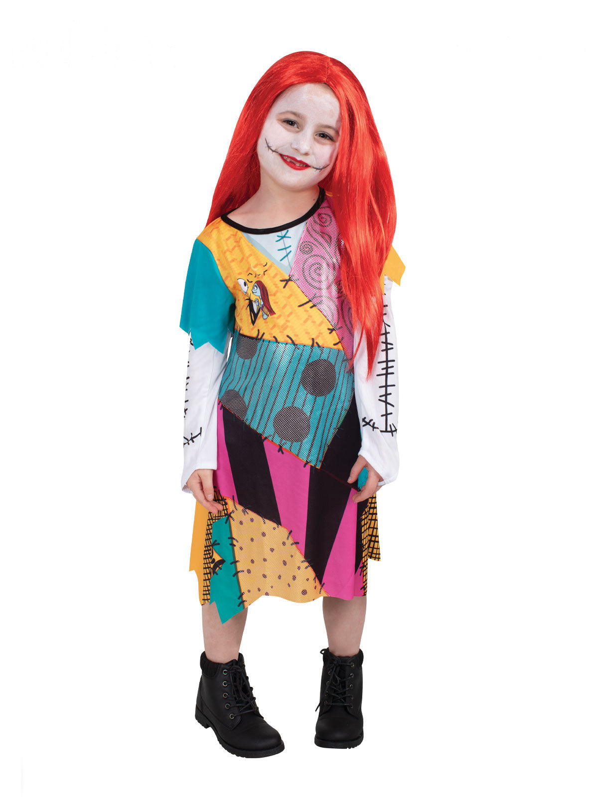 Girl wearing a Sally patchwork dress with printed stitching, scar-stitch sleeves and long red wig