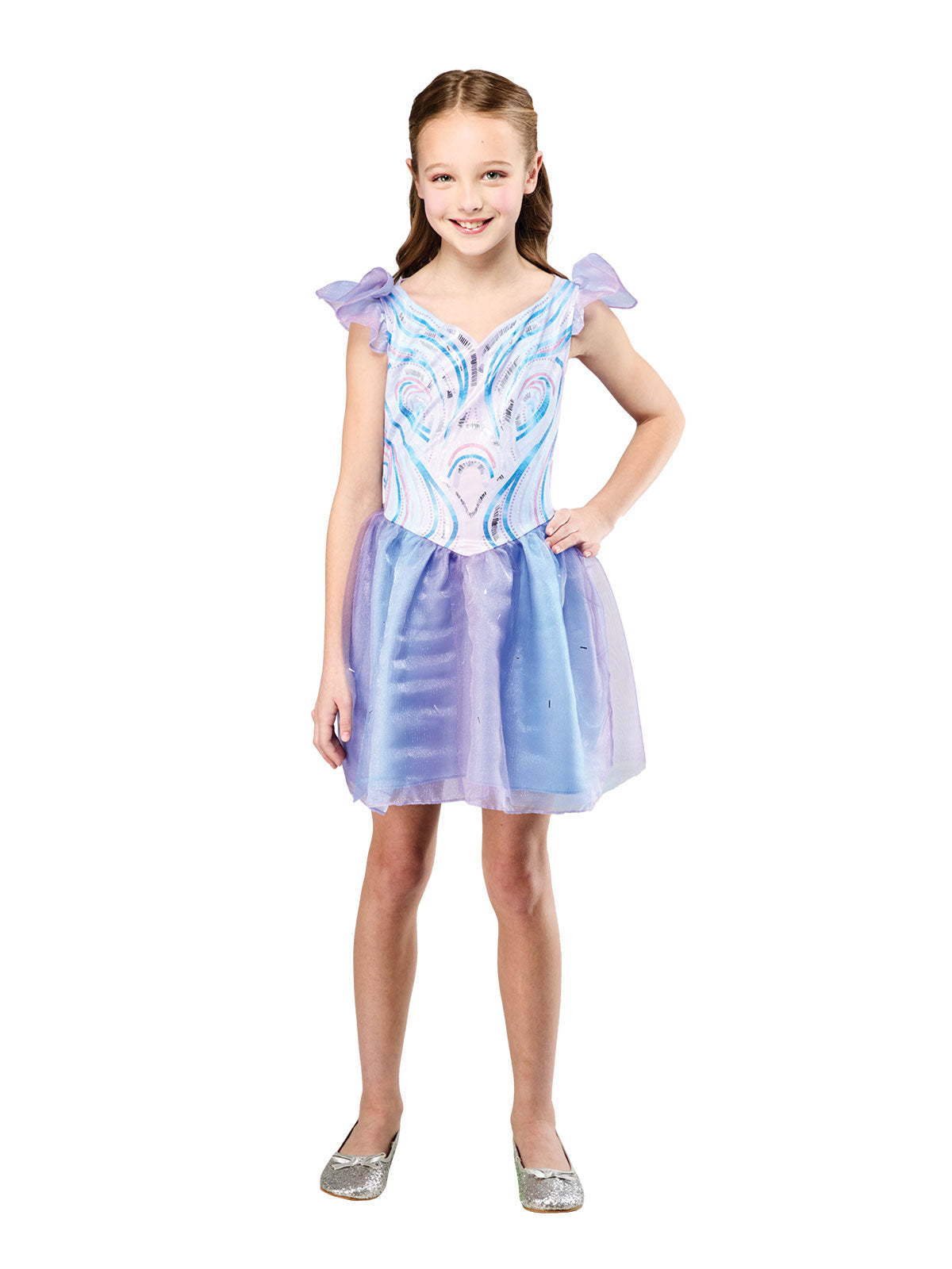 Girl standing in the periwinkle Glinda dress with her hands by her sides