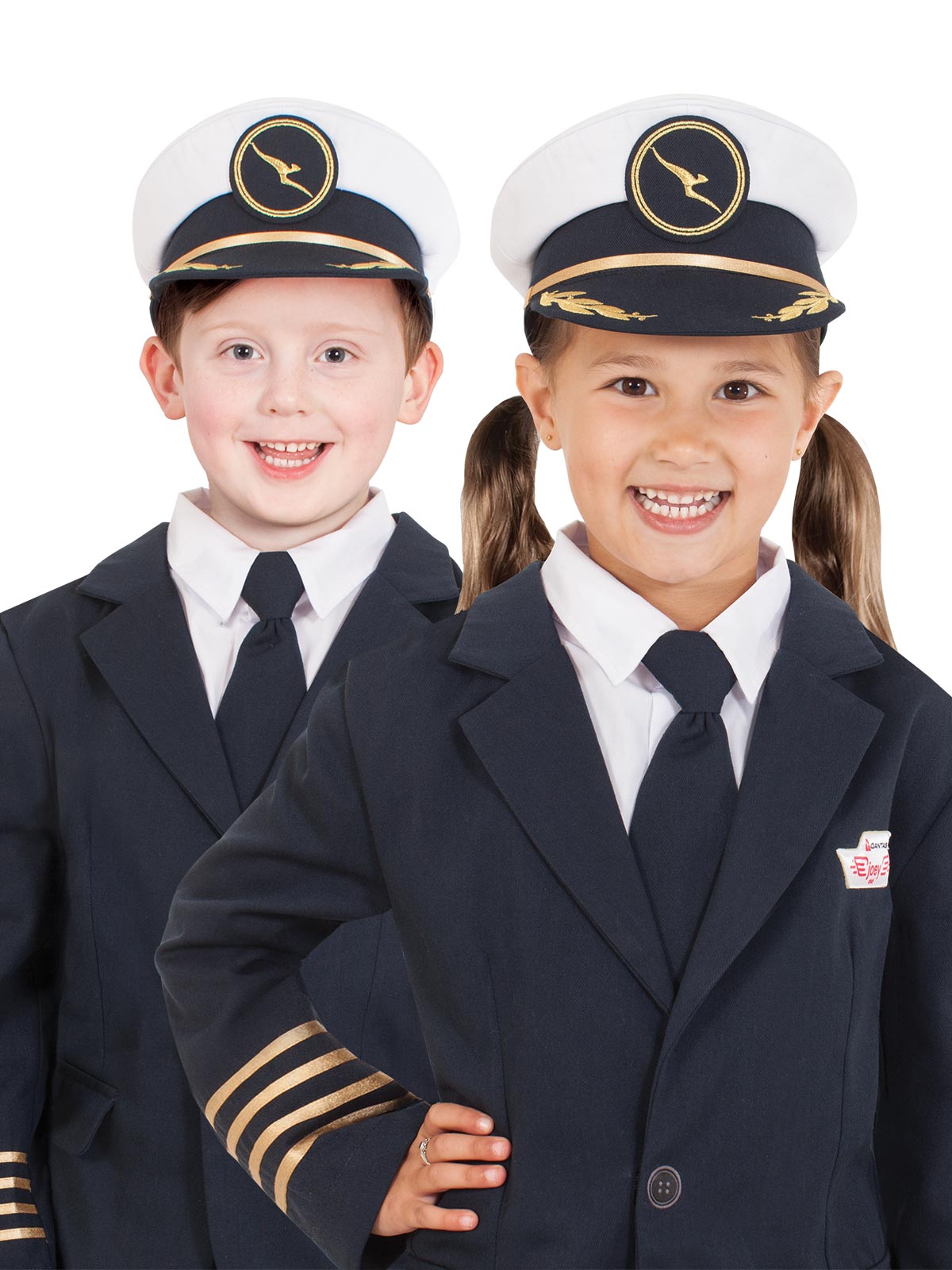 Two children wearing white Qantas pilot's hats with navy peaks