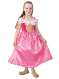 Girl in Aurora Ultimate Princess dress with gold sequin bodice, white shoulder peplum and pink skirt