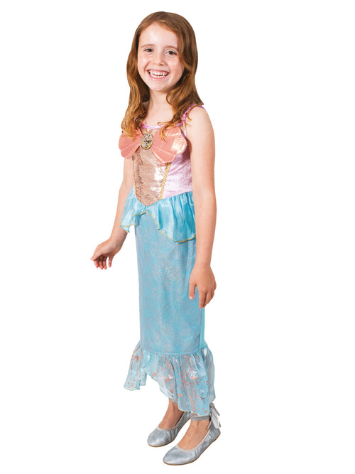 Girl in Ariel Ultimate Princess dress with shimmery bodice and flowing light blue organza skirt