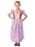 Girl wearing a Rapunzel dress with gold sequin velour bodice, puff sleeves and foil-dot organza skirt