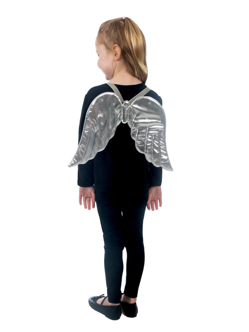 Girl in black wearing shiny silver angel wings, back view