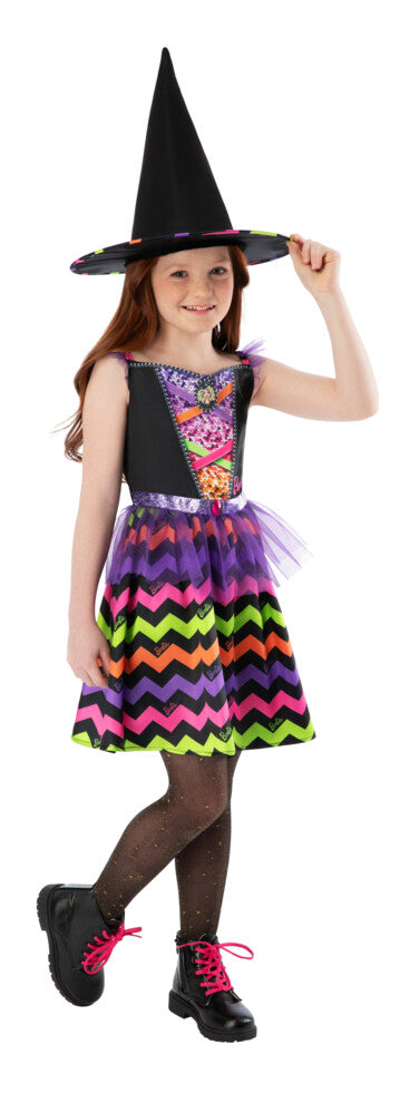 Girl in the colourful Barbie witch tutu dress with rainbow sequin bodice panel and Barbie brooch