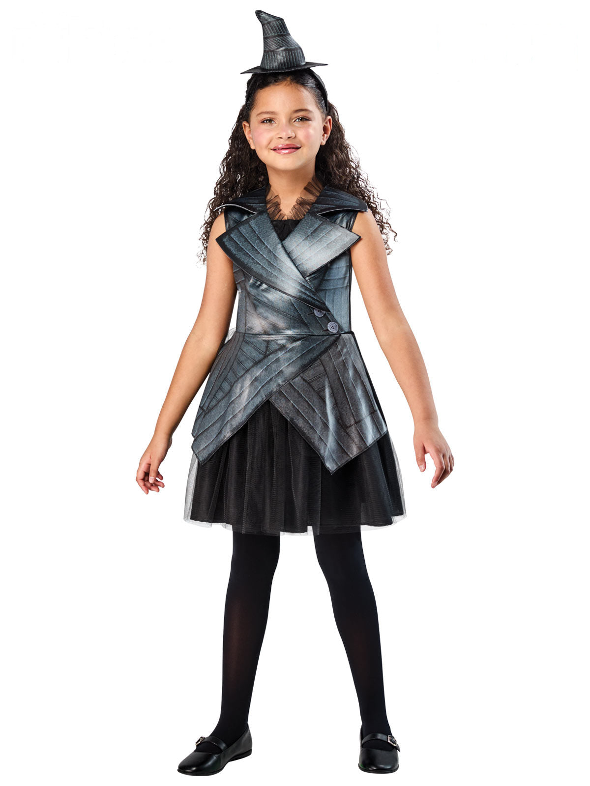 Girl in the Wicked Elphaba deluxe dress with a silver-grey leather-look jacket and a mini witch hat
