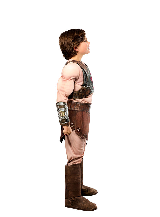 Boy side-on in the He-Man muscle jumpsuit and boot tops