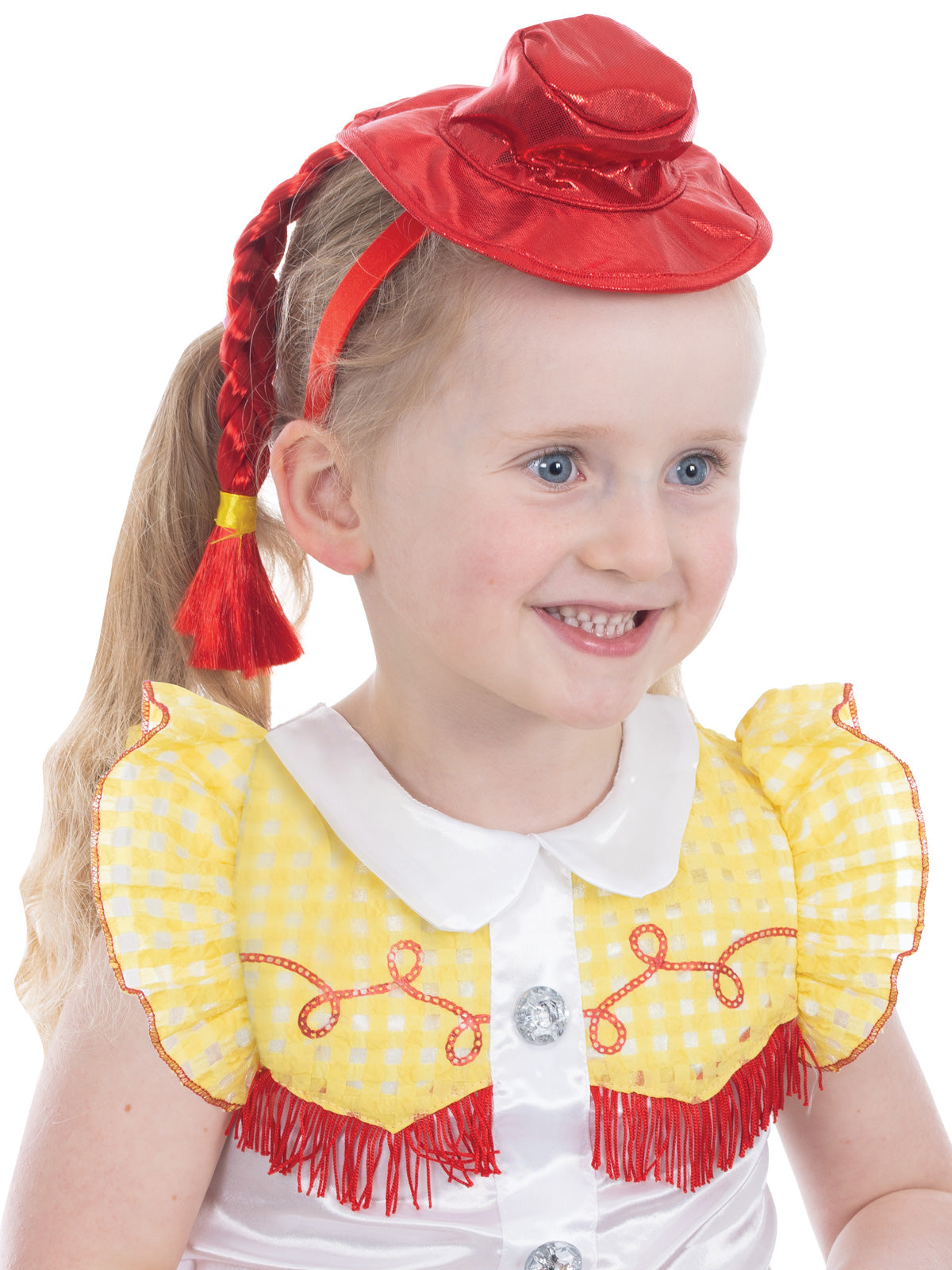 Smiling girl in the Jessie Deluxe costume showing the red hat, plait and yellow ruffled sleeves
