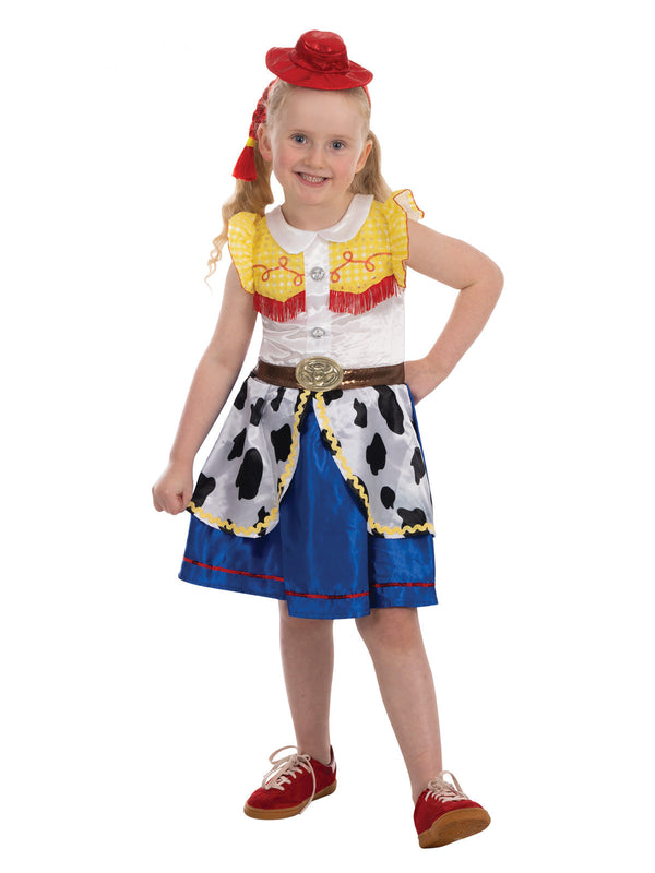 Girl in the Jessie Deluxe Toy Story costume with a yellow ruffled top, cow-print pockets and a blue skirt