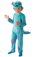 Child in a furry blue Sully jumpsuit with purple spots, spiky tail and monster headpiece with horns