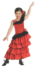 Girl wearing a red and black Spanish flamenco dress with tiered satin skirt, lacy hem and red floral headpiece