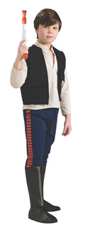 Boy in the Star Wars Han Solo costume with a white shirt, attached black vest, blue pants and boot tops