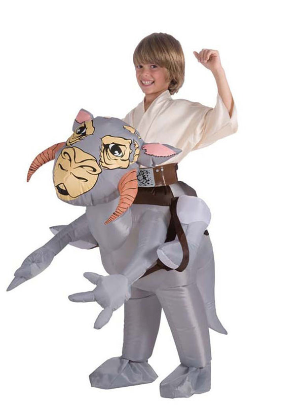 Child riding an inflatable grey Tauntaun suit with horned head and battery-fan inflation