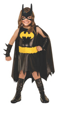 Toddler girl in black Batgirl dress with yellow bat emblem and belt, bat-eared mask, cape and boot tops
