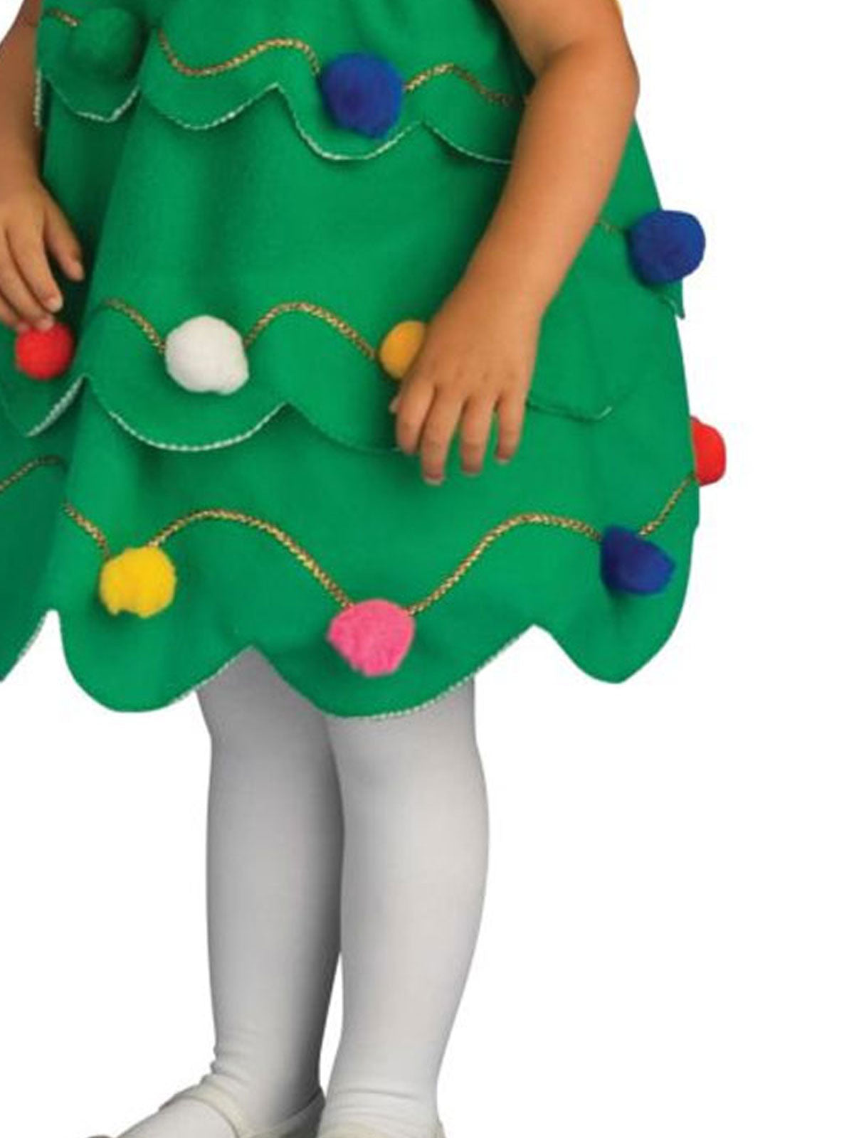 Close-up of the Little Christmas Tree layered green felt dress with pom poms and gold piping