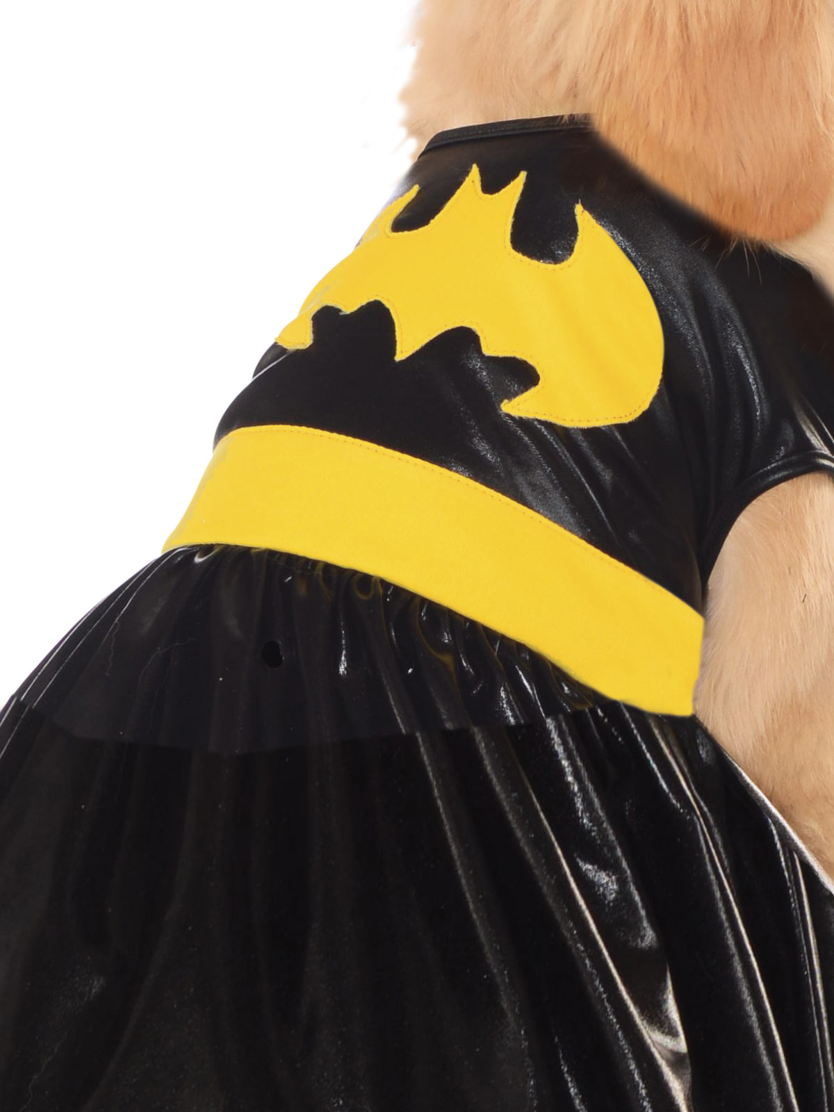 Close-up of the Batgirl pet dress showing the yellow bat emblem and belt on black faux vinyl