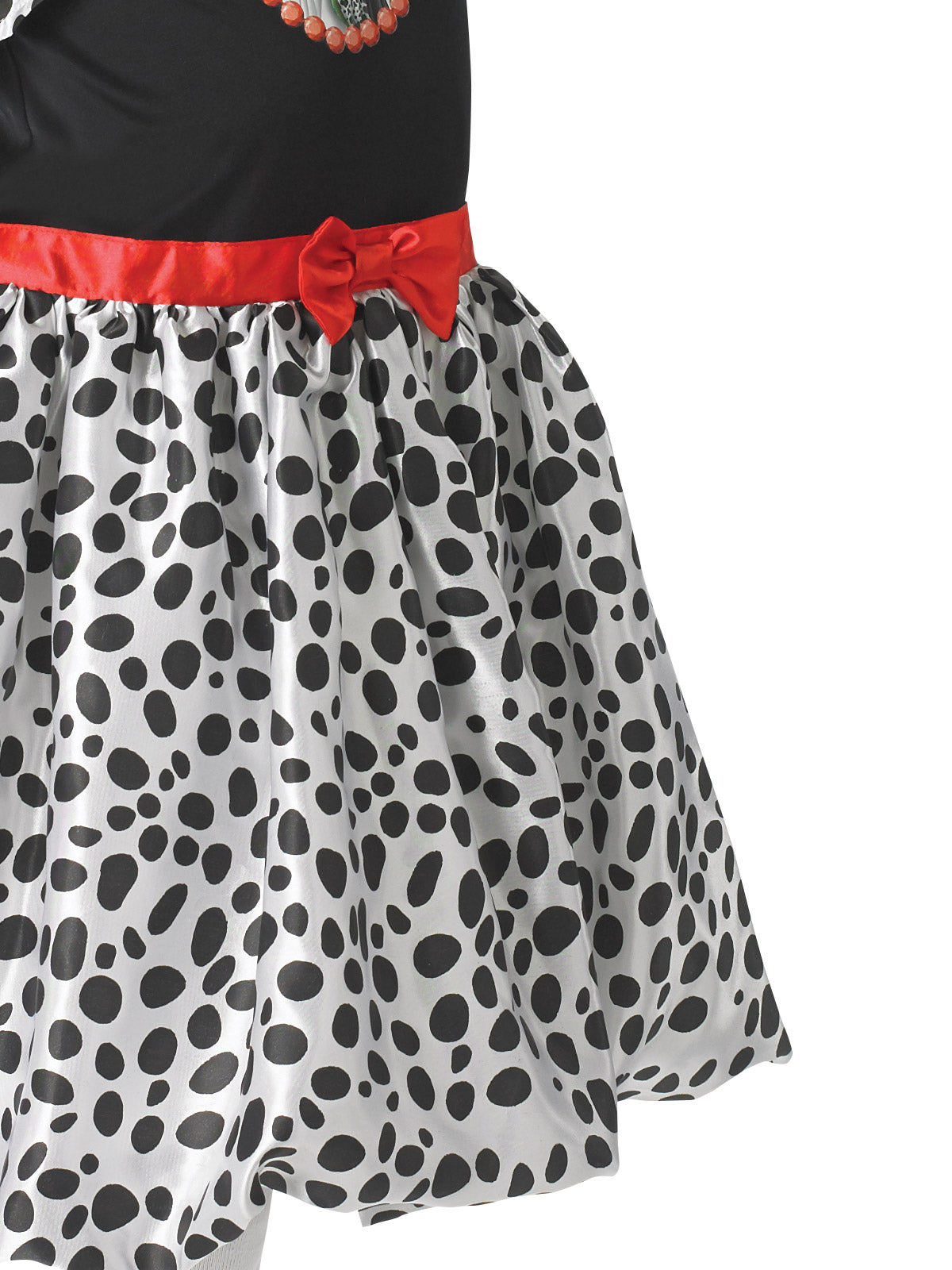 Close-up of the Cruella dress's spotted skirt and red satin waistband
