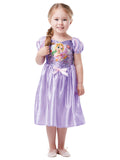 Toddler girl wearing a lilac Rapunzel satin dress with character art bodice, puff sleeves and bow