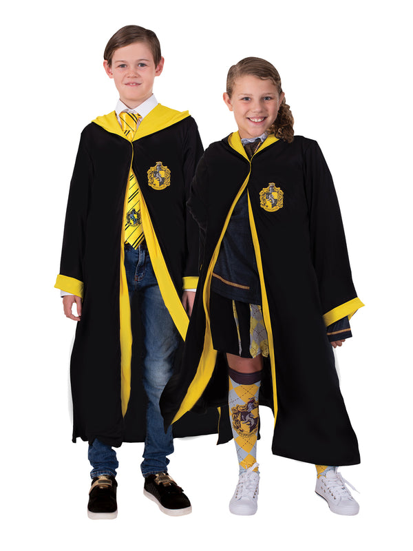 Boy and girl in the Harry Potter Hufflepuff hooded robe, black with yellow lining and House crest