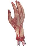 Severed gory hand prop with bloody wrist and exposed bone