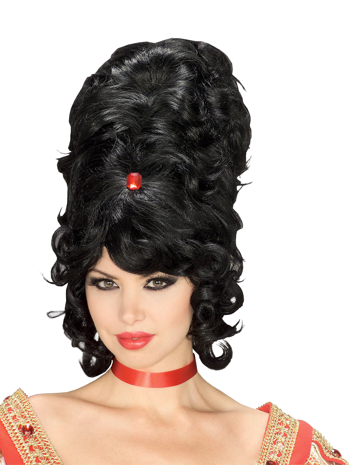 Woman wearing a tall black curly beehive wig with side fringe