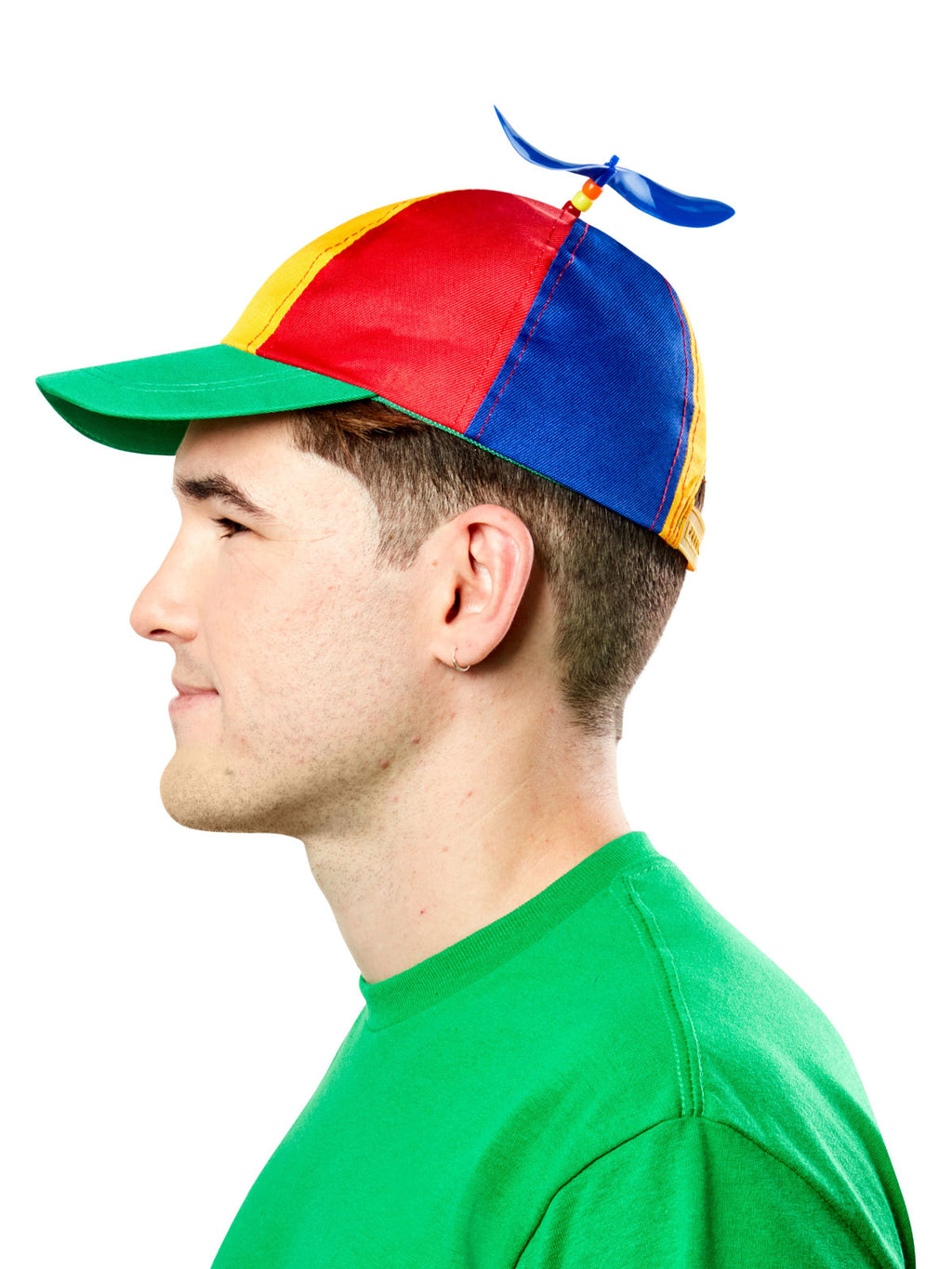 Side view of a man wearing the multi-coloured propeller cap