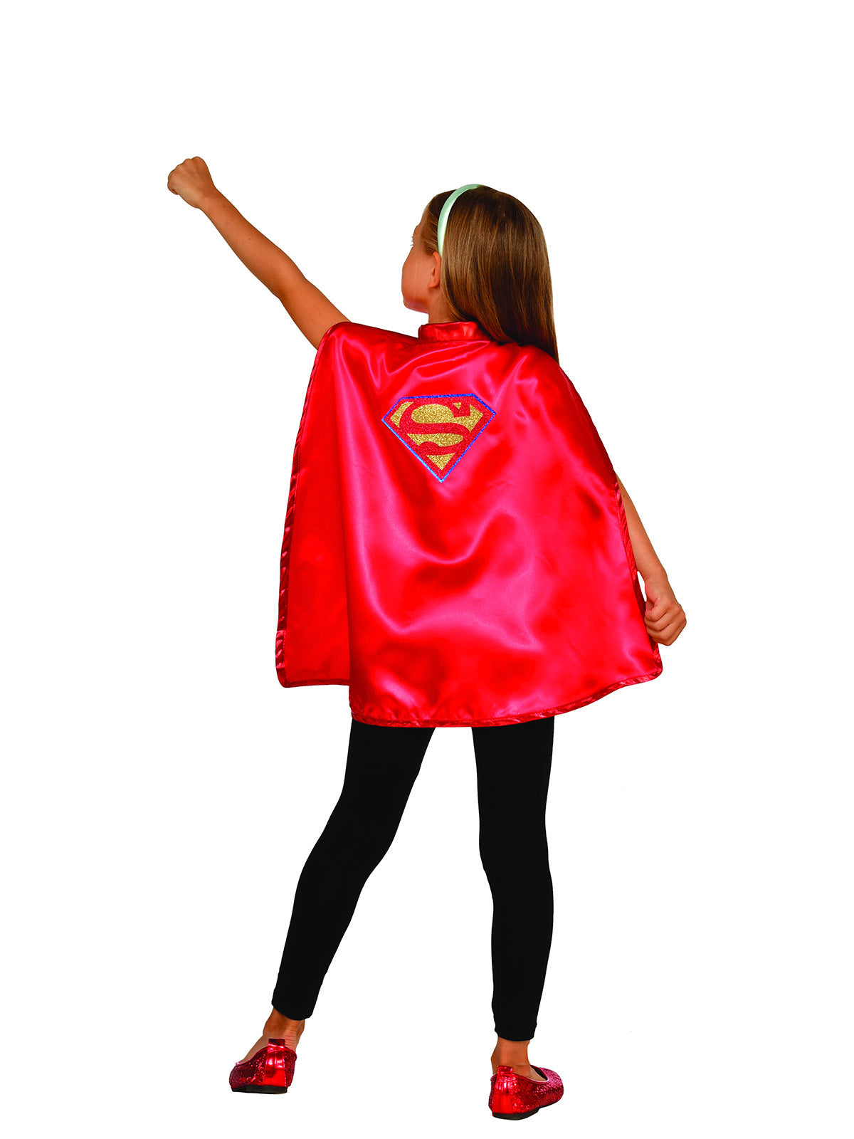Back view of a girl wearing the red Supergirl cape with glitter emblem and headband