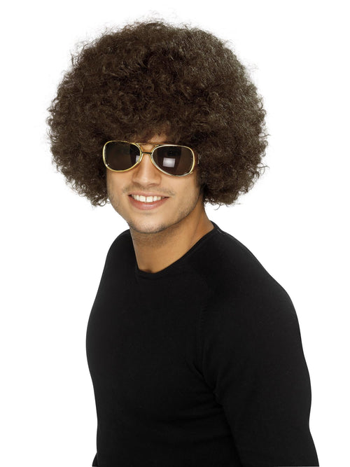 Man wearing a big brown 70s afro wig